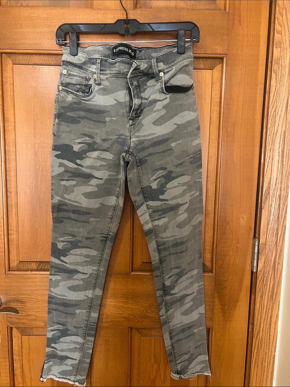 Express camo skinny jeans